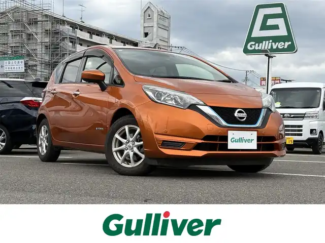 日産 ノート e－パワー X 大分県 2016(平28)年 5.4万km プレミアムコロナオレンジ インテリジェントルームミラー　/エマージェンシーブレーキ　/ソナー　/純正SDナビ　/・アラウンドビューモニター　/・フルセグTV/BT/CD/DVD　/純正ドライブレコーダー　/ETC　/LEDヘッドライト　/オートライト/ステアリングスイッチ/スペアキー×1/取扱説明書/保証書