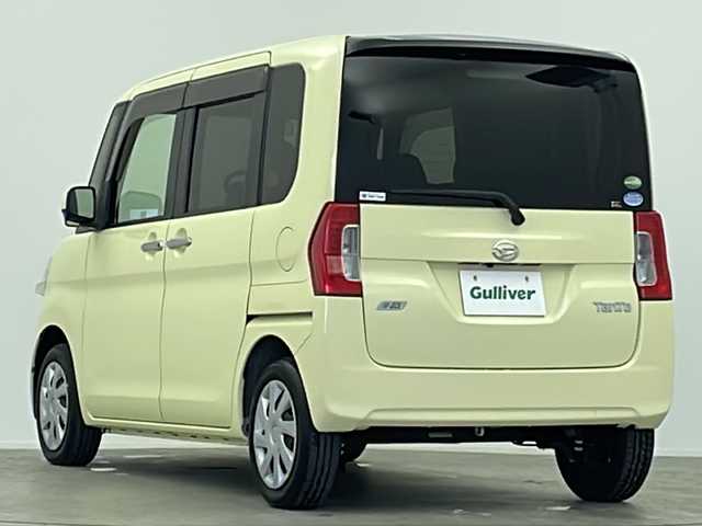 ダイハツ タント X ターボ SA 大阪府 2014(平26)年 5.1万km コットンアイボリー 純正SDナビ/【BT/フルセグ/AUX/DVD」/ETC/バックカメラ/両側パワースライドドア/アイドリングストップ/衝突被害軽減システム/横滑り防止装置/スタッドレスタイヤ積み込み/純正ミッキーマウスシートカバー/純正ミッキーマウスフロアマット/オートライト/サンシェード