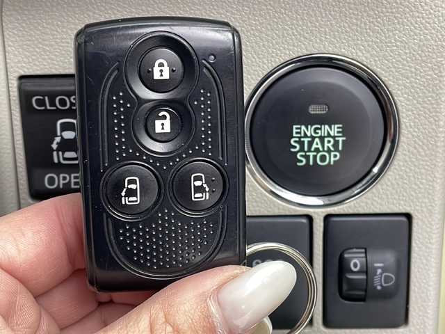 ダイハツ タント X ターボ SA 大阪府 2014(平26)年 5.1万km コットンアイボリー 純正SDナビ/【BT/フルセグ/AUX/DVD」/ETC/バックカメラ/両側パワースライドドア/アイドリングストップ/衝突被害軽減システム/横滑り防止装置/スタッドレスタイヤ積み込み/純正ミッキーマウスシートカバー/純正ミッキーマウスフロアマット/オートライト/サンシェード