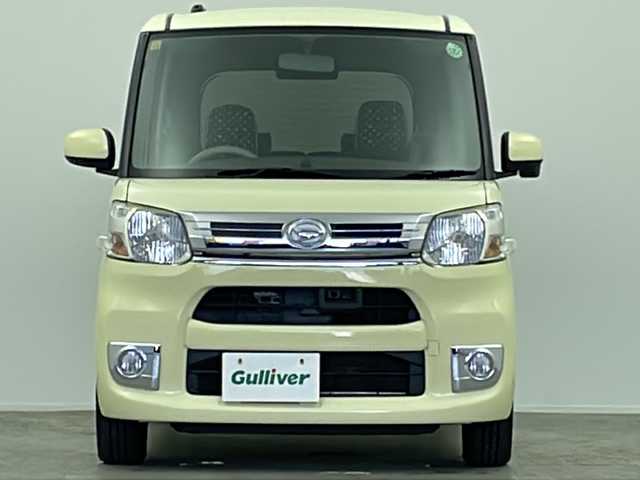 ダイハツ タント X ターボ SA 大阪府 2014(平26)年 5.1万km コットンアイボリー 純正SDナビ/【BT/フルセグ/AUX/DVD」/ETC/バックカメラ/両側パワースライドドア/アイドリングストップ/衝突被害軽減システム/横滑り防止装置/スタッドレスタイヤ積み込み/純正ミッキーマウスシートカバー/純正ミッキーマウスフロアマット/オートライト/サンシェード