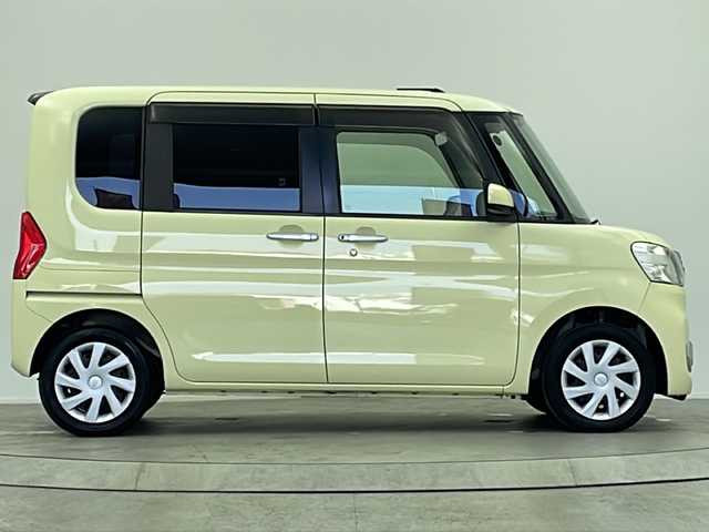 ダイハツ タント X ターボ SA 大阪府 2014(平26)年 5.1万km コットンアイボリー 純正SDナビ/【BT/フルセグ/AUX/DVD」/ETC/バックカメラ/両側パワースライドドア/アイドリングストップ/衝突被害軽減システム/横滑り防止装置/スタッドレスタイヤ積み込み/純正ミッキーマウスシートカバー/純正ミッキーマウスフロアマット/オートライト/サンシェード