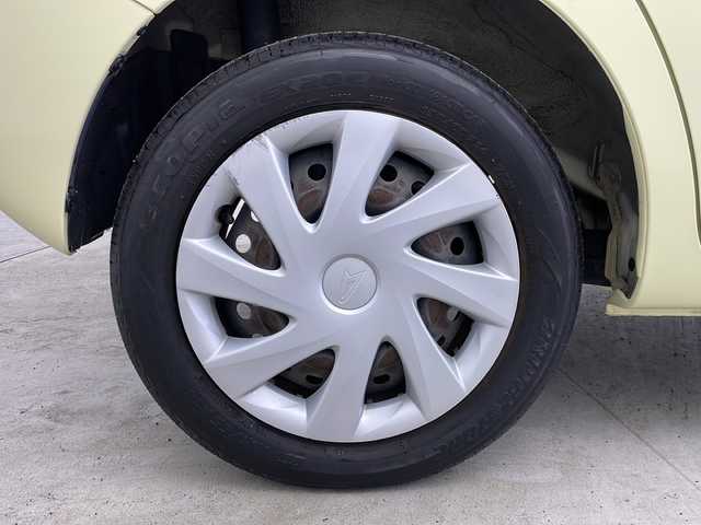 ダイハツ タント X ターボ SA 大阪府 2014(平26)年 5.1万km コットンアイボリー 純正SDナビ/【BT/フルセグ/AUX/DVD」/ETC/バックカメラ/両側パワースライドドア/アイドリングストップ/衝突被害軽減システム/横滑り防止装置/スタッドレスタイヤ積み込み/純正ミッキーマウスシートカバー/純正ミッキーマウスフロアマット/オートライト/サンシェード