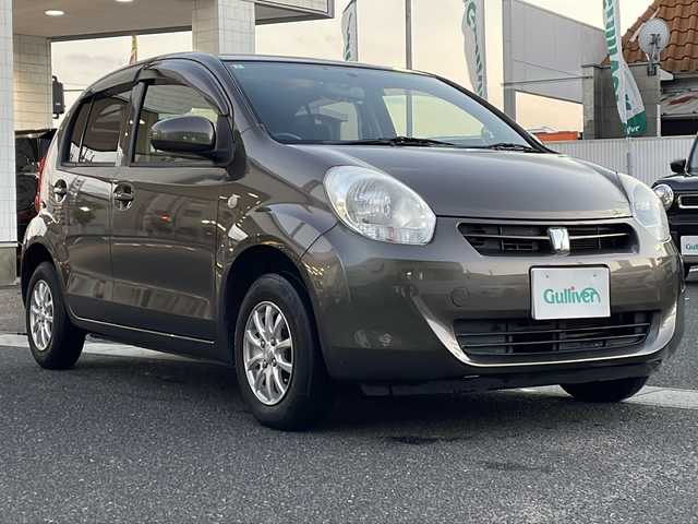 トヨタ パッソ X クツロギ 岡山県 2012(平24)年 6.9万km グレーメタリック 登録時走行距離68741km/ミュージックプレイヤー/ETC/社外１３インチアルミホイール/パワーステアリング/パワーウィンドウ/純正フロアマット/ハロゲンヘッドライト/ベンチシート/ドアバイザー