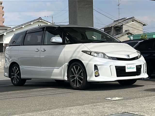 トヨタ エスティマ アエラス プレミアムエディション 愛媛県 2014(平26)年 7.8万km ホワイトパールクリスタルシャイン 純正ナビ/バックカメラ/社外フリップダウンモニター(TVM－FW1030)/フルセグテレビ/クルーズコントロール/両側パワースライドドア/社外フォグランプ/ハーフレザーシート/オートライト/ＥＴＣ/スマートキー/純正フロアマット/純正アルミホイール