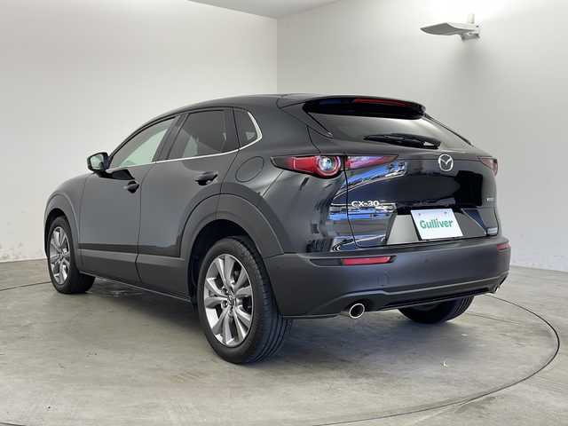 マツダ ＣＸ－３０ 20S プロアクティブツーリングセレ 兵庫県 2021(令3)年 2.5万km ジェットブラックマイカ ・純正8.8インチSDナビ/　Bluetoothオーディオ/　CD/DVD再生/　USB接続/　フルセグテレビ/・アラウンドビューモニター/・ETC/・衝突被害軽減システム/・レーダークルーズコントロール/・レーンキープアシスト/・ドライバーモニタリングシステム/・安全運転支援システム（i-ACTIVSENSE）/・前側方接近車両検知/・後側方接近車両検知/・ブラインドスポットモニター/・前方ドライブレコーダー/・電動リアゲート/・社外フロアマット/・シートヒーター（運転席・助手席）/・メモリーパワーシート（運転席）/・アイドリングストップ/・革巻きステアリング/・ステアリングリモコン/・ステアリングヒーター/・パドルシフト/・電動パーキングブレーキ/・オートブレーキホールド/・純正18インチアルミホイール/・ABS/・横滑り防止機能/・前後コーナーセンサー/・盗難防止装置/・オートライト/・オートマチックハイビーム/・LEDヘッドライト/・W＋サイドエアバック/・オートエアコン/・スマートキー