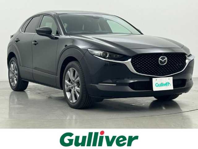 マツダ ＣＸ－３０ 20S プロアクティブツーリングセレ 熊本県 2021(令3)年 2.5万km ジェットブラックマイカ ・禁煙車/・純正8.8インチSDナビ/　Bluetoothオーディオ/　CD/DVD再生/　USB接続/　フルセグテレビ/・アラウンドビューモニター/・ETC/・衝突被害軽減システム/・レーダークルーズコントロール/・レーンキープアシスト/・ドライバーモニタリングシステム/・安全運転支援システム（i-ACTIVSENSE）/・前側方接近車両検知/・後側方接近車両検知/・ブラインドスポットモニター/・前方ドライブレコーダー/・電動リアゲート/・社外フロアマット/・シートヒーター（運転席・助手席）/・メモリーパワーシート（運転席）/・アイドリングストップ/・革巻きステアリング/・ステアリングリモコン/・ステアリングヒーター/・パドルシフト/・電動パーキングブレーキ/・オートブレーキホールド/・純正18インチアルミホイール/・ABS/・横滑り防止機能/・前後コーナーセンサー/・盗難防止装置/・オートライト/・オートマチックハイビーム/・LEDヘッドライト/・W＋サイドエアバック/・オートエアコン/・スマートキー