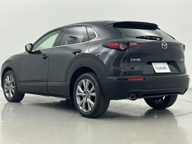 マツダ ＣＸ－３０ 20S プロアクティブツーリングセレ 熊本県 2021(令3)年 2.5万km ジェットブラックマイカ ・禁煙車/・純正8.8インチSDナビ/　Bluetoothオーディオ/　CD/DVD再生/　USB接続/　フルセグテレビ/・アラウンドビューモニター/・ETC/・衝突被害軽減システム/・レーダークルーズコントロール/・レーンキープアシスト/・ドライバーモニタリングシステム/・安全運転支援システム（i-ACTIVSENSE）/・前側方接近車両検知/・後側方接近車両検知/・ブラインドスポットモニター/・前方ドライブレコーダー/・電動リアゲート/・社外フロアマット/・シートヒーター（運転席・助手席）/・メモリーパワーシート（運転席）/・アイドリングストップ/・革巻きステアリング/・ステアリングリモコン/・ステアリングヒーター/・パドルシフト/・電動パーキングブレーキ/・オートブレーキホールド/・純正18インチアルミホイール/・ABS/・横滑り防止機能/・前後コーナーセンサー/・盗難防止装置/・オートライト/・オートマチックハイビーム/・LEDヘッドライト/・W＋サイドエアバック/・オートエアコン/・スマートキー