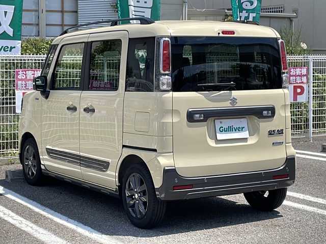 スズキ スペーシア ギア HYBRID XZ 兵庫県 2022(令4)年 0.9万km シフォンアイボリーM 登録時走行距離8766km/ワンオーナー/セーフティサポート/デュアルカメラブレーキサポート/アダプティブクルーズコントロール/純正8型ナビ/CD/DVD/フルセグ/Bluetooth/プッシュスタート/スマートキー/両側パワースライドドア/ガンメタリックドアミラー(電動オート格納機能)/ガンメタリックアウトサイドドアハンドル/ガンメタリックドアガーニッシュ/ガンメタリックサイドシルプロテクター/ガンメタリックバックドアガーニッシュ/ガンメタリックエンブレム/下部ガンメタリックプロテクター付リアバンパー/LEDヘッドランプ/LEDフロントフォグランプ/ヘッドアップディスプレイ/エコクール/リアヒーターダクト/スリムサーキュレーター/前席シートヒーター/後方視界支援ミラー/ETC/ルーフレール/保証書/取説/スペアキー1本