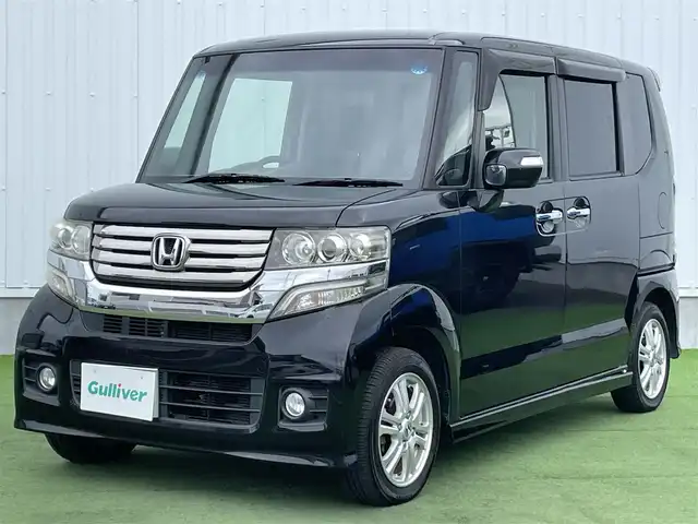 ホンダ Ｎ ＢＯＸ カスタム G Lパッケージ 香川県 2012(平24)年 8.2万km クリスタルブラックパール 社外8インチSDナビ/→フルセグ/CD/DVD/Bluetooth/片側パワースライドドア/純正14インチアルミ/純正フロアマット/ピタ駐ミラー/横滑り防止装置/盗難防止装置/アイドリングストップ/ETC/ベンチシート/パワーステアリング/ステアリングリモコン/プッシュスタート/スマートキー