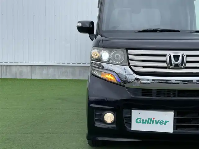 ホンダ Ｎ ＢＯＸ カスタム G Lパッケージ 香川県 2012(平24)年 8.2万km クリスタルブラックパール 社外8インチSDナビ/→フルセグ/CD/DVD/Bluetooth/片側パワースライドドア/純正14インチアルミ/純正フロアマット/ピタ駐ミラー/横滑り防止装置/盗難防止装置/アイドリングストップ/ETC/ベンチシート/パワーステアリング/ステアリングリモコン/プッシュスタート/スマートキー