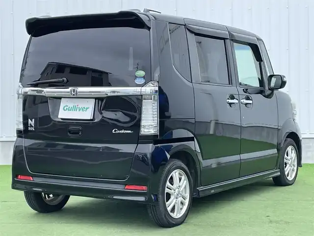 ホンダ Ｎ ＢＯＸ カスタム G Lパッケージ 香川県 2012(平24)年 8.2万km クリスタルブラックパール 社外8インチSDナビ/→フルセグ/CD/DVD/Bluetooth/片側パワースライドドア/純正14インチアルミ/純正フロアマット/ピタ駐ミラー/横滑り防止装置/盗難防止装置/アイドリングストップ/ETC/ベンチシート/パワーステアリング/ステアリングリモコン/プッシュスタート/スマートキー