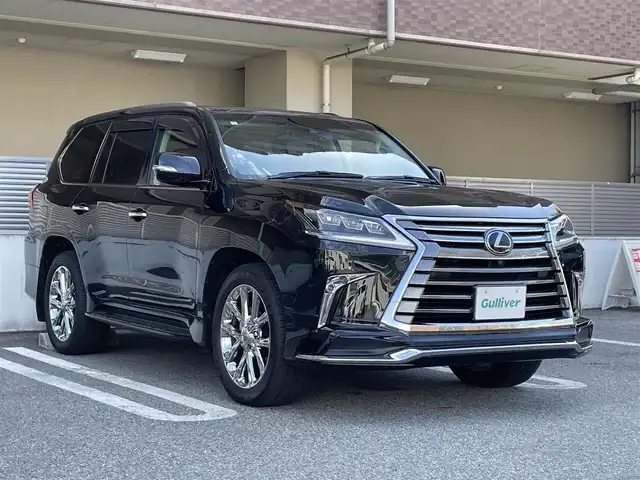 レクサス ＬＸ 570 大阪府 2016(平28)年 1.7万km スターライトブラックガラスフレーク ワンオーナー/モデリスタエアロ/サンルーフ/ルーフレール/マークレビンソン/全方位モニター/リアエンターテイメントシステム/クールBOX/純正HDDナビ/・AM/FM/CD/DVD/BT/フルセグ/HDMI/エアサスペンション/ヘッドアップディスプレイ/茶革シート/・全席パワーシート/・D席メモリシート/・D席/N席シートヒーター/・D席/N席エアシート/ステアリングヒーター/電動リアゲート/三眼LEDヘッドライト/電子パーキング/レーダー探知機（TZ-R001A）/ドライブレコーダー（TZ-D001）/ETC2/0/トヨタセーフティーセンス/・プリクラッシュセーフティー/・レーンディパーチャーアラート/・ブラインドスポットモニター/・レーダークルーズコントロール/・フロント・バックソナー/・リアクロストラフィックアラート/スペアキー/保証書/取扱説明書/記録簿H28/H29/H30/R2/R3/R4/R5/R6/R7