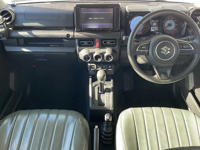 スズキ ジムニー XC 長野県 2020(令2)年 2.1万km ミディアムグレー ４WD/セーフティサポート/純正8型ナビフルセグＴＶ/バックカメラ/クルーズコントロール/プッシュスタート/シートヒーター/オールテレインタイヤ/社外16インチアルミ/社外足回り/社外テールランプ/社外フロントグリル/社外オーバーフェンダー/シートカバー/背面タイヤ/スペアキー