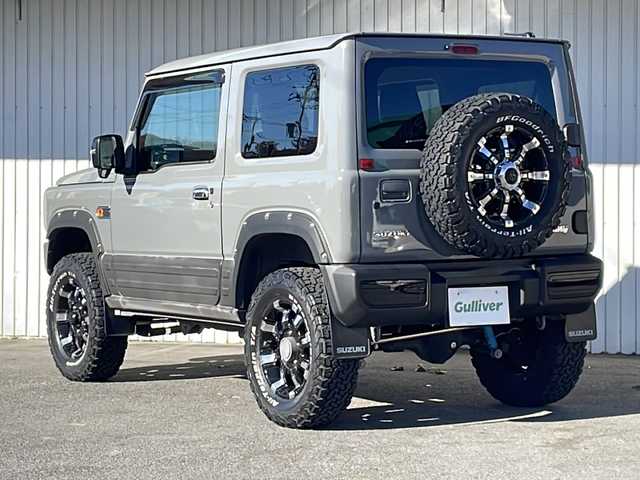 スズキ ジムニー XC 長野県 2020(令2)年 2.1万km ミディアムグレー ４WD/セーフティサポート/純正8型ナビフルセグＴＶ/バックカメラ/クルーズコントロール/プッシュスタート/シートヒーター/オールテレインタイヤ/社外16インチアルミ/社外足回り/社外テールランプ/社外フロントグリル/社外オーバーフェンダー/シートカバー/背面タイヤ/スペアキー