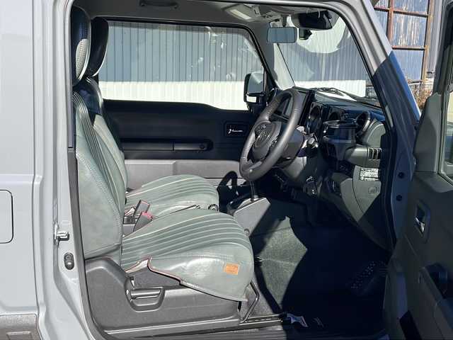 スズキ ジムニー XC 長野県 2020(令2)年 2.1万km ミディアムグレー ４WD/セーフティサポート/純正8型ナビフルセグＴＶ/バックカメラ/クルーズコントロール/プッシュスタート/シートヒーター/オールテレインタイヤ/社外16インチアルミ/社外足回り/社外テールランプ/社外フロントグリル/社外オーバーフェンダー/シートカバー/背面タイヤ/スペアキー