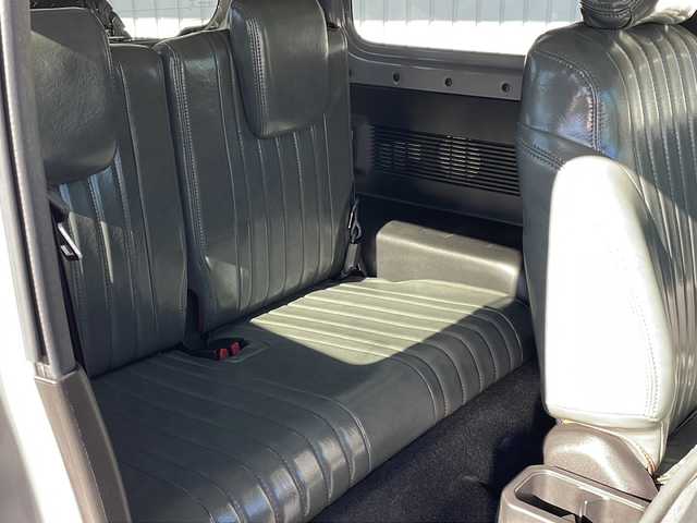 スズキ ジムニー XC 長野県 2020(令2)年 2.1万km ミディアムグレー ４WD/セーフティサポート/純正8型ナビフルセグＴＶ/バックカメラ/クルーズコントロール/プッシュスタート/シートヒーター/オールテレインタイヤ/社外16インチアルミ/社外足回り/社外テールランプ/社外フロントグリル/社外オーバーフェンダー/シートカバー/背面タイヤ/スペアキー