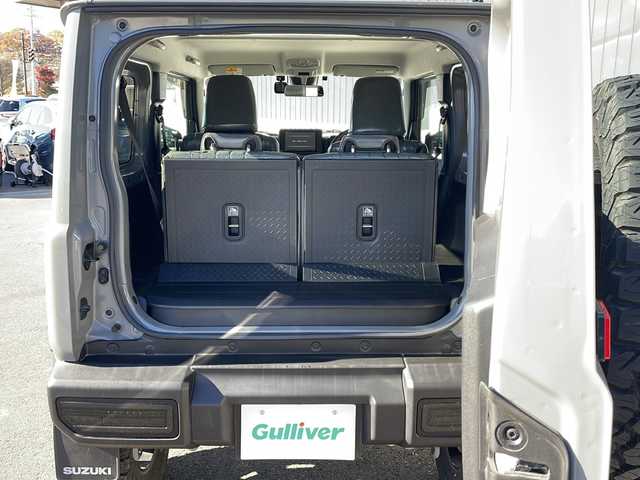 スズキ ジムニー XC 長野県 2020(令2)年 2.1万km ミディアムグレー ４WD/セーフティサポート/純正8型ナビフルセグＴＶ/バックカメラ/クルーズコントロール/プッシュスタート/シートヒーター/オールテレインタイヤ/社外16インチアルミ/社外足回り/社外テールランプ/社外フロントグリル/社外オーバーフェンダー/シートカバー/背面タイヤ/スペアキー