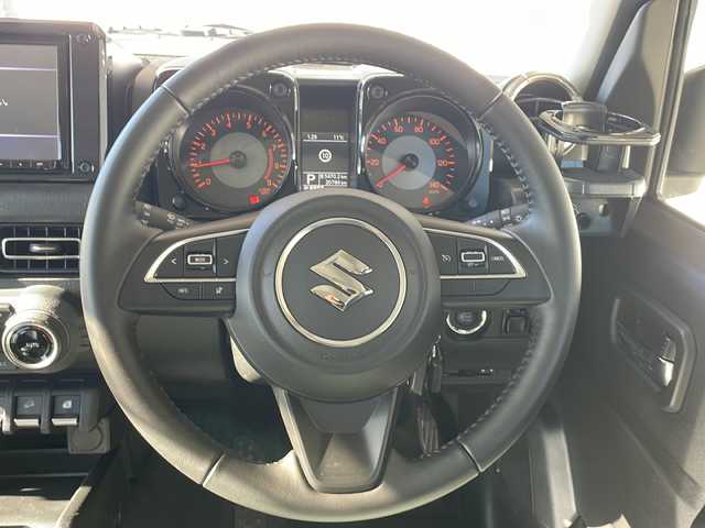 スズキ ジムニー XC 長野県 2020(令2)年 2.1万km ミディアムグレー ４WD/セーフティサポート/純正8型ナビフルセグＴＶ/バックカメラ/クルーズコントロール/プッシュスタート/シートヒーター/オールテレインタイヤ/社外16インチアルミ/社外足回り/社外テールランプ/社外フロントグリル/社外オーバーフェンダー/シートカバー/背面タイヤ/スペアキー