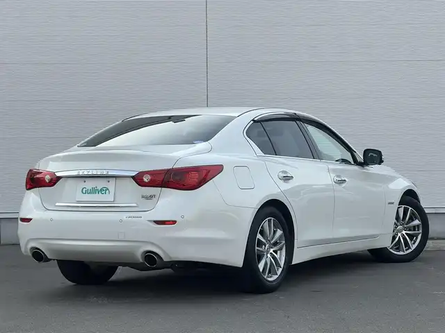 日産 スカイライン ハイブリッド 350GT FOUR Type P 秋田県 2014(平26)年 4万km クリスタルホワイトパール 純正ナビ/衝突軽減システム/スマートキー/４WD/フルセグ/LEDヘッドライト/全方位カメラ/純正アルミ/コーナーセンサー/コクルーズコントロール/前席シートヒーター/前席パワーシート/メモリー付きパワーシート/ETC/純正フロアマット/純正ドアバイザー/ステアリングスイッチ/MTモード付AT/オートエアコン/オートライト/ドライブレコーダー/社外エンジンスターター/パワーステアリング/パワーウィンドウ/電動格納ウィンカーミラー/横滑り防止