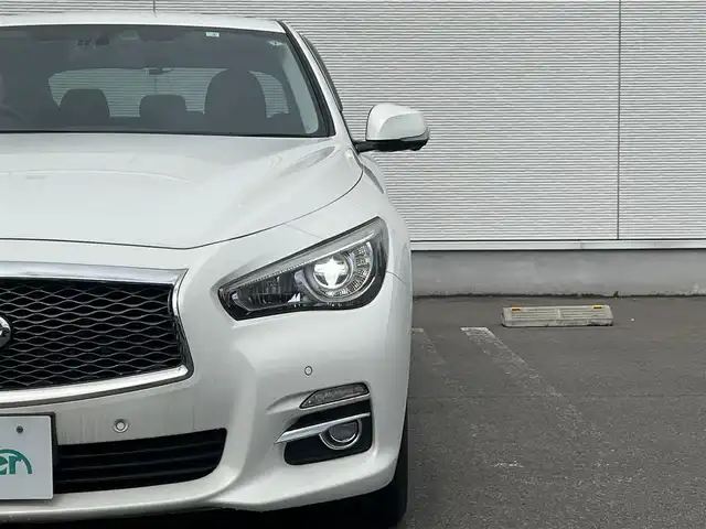 日産 スカイライン ハイブリッド 350GT FOUR Type P 秋田県 2014(平26)年 4万km クリスタルホワイトパール 純正ナビ/衝突軽減システム/スマートキー/４WD/フルセグ/LEDヘッドライト/全方位カメラ/純正アルミ/コーナーセンサー/コクルーズコントロール/前席シートヒーター/前席パワーシート/メモリー付きパワーシート/ETC/純正フロアマット/純正ドアバイザー/ステアリングスイッチ/MTモード付AT/オートエアコン/オートライト/ドライブレコーダー/社外エンジンスターター/パワーステアリング/パワーウィンドウ/電動格納ウィンカーミラー/横滑り防止