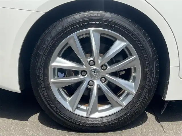 日産 スカイライン ハイブリッド 350GT FOUR Type P 秋田県 2014(平26)年 4万km クリスタルホワイトパール 純正ナビ/衝突軽減システム/スマートキー/４WD/フルセグ/LEDヘッドライト/全方位カメラ/純正アルミ/コーナーセンサー/コクルーズコントロール/前席シートヒーター/前席パワーシート/メモリー付きパワーシート/ETC/純正フロアマット/純正ドアバイザー/ステアリングスイッチ/MTモード付AT/オートエアコン/オートライト/ドライブレコーダー/社外エンジンスターター/パワーステアリング/パワーウィンドウ/電動格納ウィンカーミラー/横滑り防止