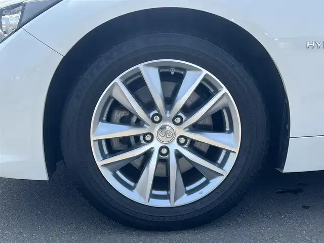 日産 スカイライン ハイブリッド 350GT FOUR Type P 秋田県 2014(平26)年 4万km クリスタルホワイトパール 純正ナビ/衝突軽減システム/スマートキー/４WD/フルセグ/LEDヘッドライト/全方位カメラ/純正アルミ/コーナーセンサー/コクルーズコントロール/前席シートヒーター/前席パワーシート/メモリー付きパワーシート/ETC/純正フロアマット/純正ドアバイザー/ステアリングスイッチ/MTモード付AT/オートエアコン/オートライト/ドライブレコーダー/社外エンジンスターター/パワーステアリング/パワーウィンドウ/電動格納ウィンカーミラー/横滑り防止
