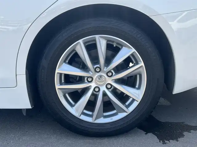 日産 スカイライン ハイブリッド 350GT FOUR Type P 秋田県 2014(平26)年 4万km クリスタルホワイトパール 純正ナビ/衝突軽減システム/スマートキー/４WD/フルセグ/LEDヘッドライト/全方位カメラ/純正アルミ/コーナーセンサー/コクルーズコントロール/前席シートヒーター/前席パワーシート/メモリー付きパワーシート/ETC/純正フロアマット/純正ドアバイザー/ステアリングスイッチ/MTモード付AT/オートエアコン/オートライト/ドライブレコーダー/社外エンジンスターター/パワーステアリング/パワーウィンドウ/電動格納ウィンカーミラー/横滑り防止