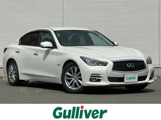 日産 スカイライン ハイブリッド 350GT FOUR Type P 秋田県 2014(平26)年 4万km クリスタルホワイトパール 純正ナビ/衝突軽減システム/スマートキー/４WD/フルセグ/LEDヘッドライト/全方位カメラ/純正アルミ/コーナーセンサー/コクルーズコントロール/前席シートヒーター/前席パワーシート/メモリー付きパワーシート/ETC/純正フロアマット/純正ドアバイザー/ステアリングスイッチ/MTモード付AT/オートエアコン/オートライト/ドライブレコーダー/社外エンジンスターター/パワーステアリング/パワーウィンドウ/電動格納ウィンカーミラー/横滑り防止