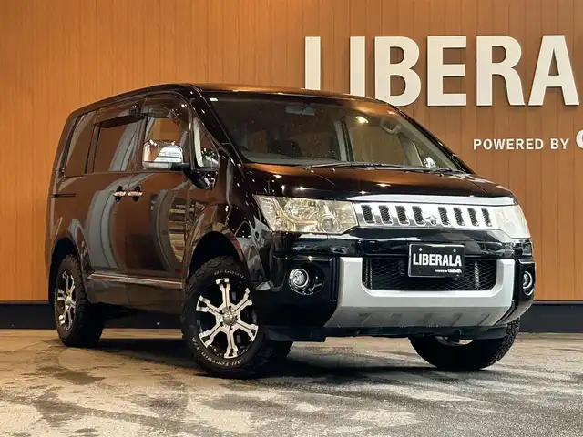 三菱 デリカＤ：５ G－Premium 宮城県 2010(平22)年 12.5万km ディープブラックマイカ ４WD/純正HDDナビ/バックカメラ/ETC/フルセグTV/運転席パワーシート/シートヒーター/両側パワースライドドア/パドルシフト/後席フリップダウンモニター/オートライト/シートカバー