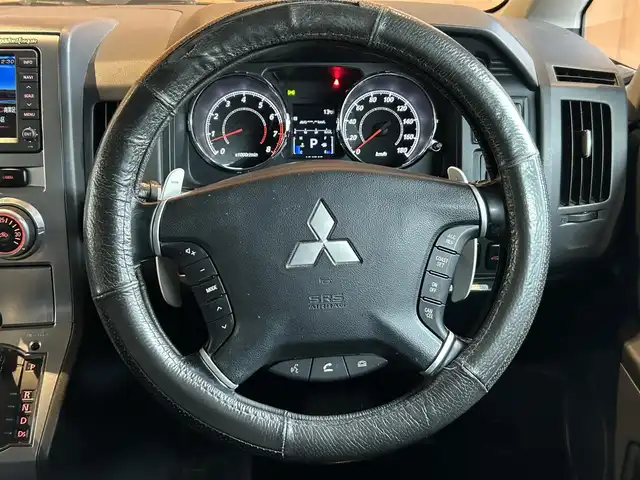 三菱 デリカＤ：５ G－Premium 宮城県 2010(平22)年 12.5万km ディープブラックマイカ ４WD/純正HDDナビ/バックカメラ/ETC/フルセグTV/運転席パワーシート/シートヒーター/両側パワースライドドア/パドルシフト/後席フリップダウンモニター/オートライト/シートカバー