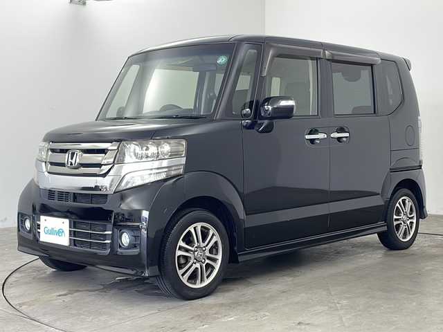 ホンダ Ｎ ＢＯＸ カスタム G Lパッケージ 兵庫県 2015(平27)年 3.9万km スマートブラック ・社外ナビ/CD/DVD/BT/TV/・ETC/・14インチアルミホイール/・ディスチャージヘッドライト〈HID〉/・VSA（ABS＋TCS＋横すべり抑制）/・エマージェンシーストップシグナル/・ヒルスタートアシスト機能/・アイドリングストップシステム/・プラズマクラスター/・ECONスイッチ（ECONモード）/・スライドドア・イージークローザー（リア両側）/・パワースライドドア（リア左側）/・Hondaスマートキーシステム/・ドアミラーウインカー/・スマートキー/・スペアキー/・保証書/・取扱説明書