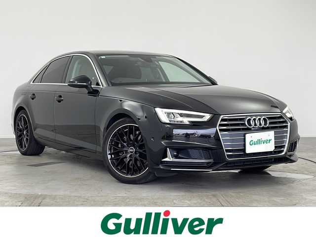 アウディ Ａ４ 35TFSIスポーツ ブラックエレガンス 愛知県 2019(令1)年 1.3万km ミトスブラックメタリック 125台限定車”black elegance”/禁煙車/純正MMIナビ/フルセグTV/サラウンドビューカメラ/バックカメラ/ビルトインETC2.0/純正ドライブレコーダー/マルチカラーアンビエントライト[特別装備]/純正フロアマット[特別装備]/純正18インチアルミホイール(10Yスポークデザイングロスブラックポリッシュド)[特別装備]/ラグジュアリーパッケージ/アシスタンスベーシックパッケージ/アシスタンスパッケージ/アウディプレセンスシティ/アウディプレセンスリヤ/アダプティブクルーズコントロール/アクティブレーンアシスト/アウディサイドアシスト/アウディパークアシスト/LEDヘッドライト/ハイビームアシスト/LEDリヤコンビライト/3ゾーンオートエアコン/パーシャルレザーシート/前席パワーシート/運転席ポジションメモリー/内装アルミニウムエリプス加飾/バーチャルコックピット/タイヤ空気圧警告/革巻きステアリング/ステアリングスイッチ/パドルシフト/プッシュスタート/電動格納ミラーウィンカー/電子パーキングブレーキ/ブレーキホールド/新車保証書・取扱説明書/記録簿R3~R6