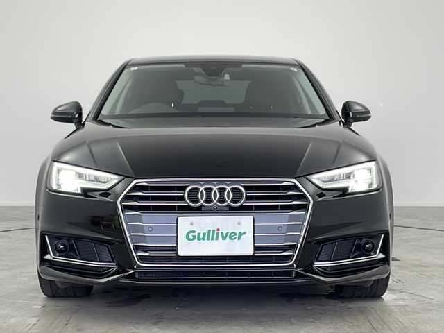 アウディ Ａ４ 35TFSIスポーツ ブラックエレガンス 愛知県 2019(令1)年 1.3万km ミトスブラックメタリック 125台限定車”black elegance”/禁煙車/純正MMIナビ/フルセグTV/サラウンドビューカメラ/バックカメラ/ビルトインETC2.0/純正ドライブレコーダー/マルチカラーアンビエントライト[特別装備]/純正フロアマット[特別装備]/純正18インチアルミホイール(10Yスポークデザイングロスブラックポリッシュド)[特別装備]/ラグジュアリーパッケージ/アシスタンスベーシックパッケージ/アシスタンスパッケージ/アウディプレセンスシティ/アウディプレセンスリヤ/アダプティブクルーズコントロール/アクティブレーンアシスト/アウディサイドアシスト/アウディパークアシスト/LEDヘッドライト/ハイビームアシスト/LEDリヤコンビライト/3ゾーンオートエアコン/パーシャルレザーシート/前席パワーシート/運転席ポジションメモリー/内装アルミニウムエリプス加飾/バーチャルコックピット/タイヤ空気圧警告/革巻きステアリング/ステアリングスイッチ/パドルシフト/プッシュスタート/電動格納ミラーウィンカー/電子パーキングブレーキ/ブレーキホールド/新車保証書・取扱説明書/記録簿R3~R6