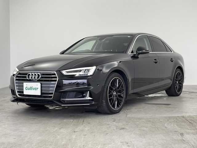 アウディ Ａ４ 35TFSIスポーツ ブラックエレガンス 愛知県 2019(令1)年 1.3万km ミトスブラックメタリック 125台限定車”black elegance”/禁煙車/純正MMIナビ/フルセグTV/サラウンドビューカメラ/バックカメラ/ビルトインETC2.0/純正ドライブレコーダー/マルチカラーアンビエントライト[特別装備]/純正フロアマット[特別装備]/純正18インチアルミホイール(10Yスポークデザイングロスブラックポリッシュド)[特別装備]/ラグジュアリーパッケージ/アシスタンスベーシックパッケージ/アシスタンスパッケージ/アウディプレセンスシティ/アウディプレセンスリヤ/アダプティブクルーズコントロール/アクティブレーンアシスト/アウディサイドアシスト/アウディパークアシスト/LEDヘッドライト/ハイビームアシスト/LEDリヤコンビライト/3ゾーンオートエアコン/パーシャルレザーシート/前席パワーシート/運転席ポジションメモリー/内装アルミニウムエリプス加飾/バーチャルコックピット/タイヤ空気圧警告/革巻きステアリング/ステアリングスイッチ/パドルシフト/プッシュスタート/電動格納ミラーウィンカー/電子パーキングブレーキ/ブレーキホールド/新車保証書・取扱説明書/記録簿R3~R6