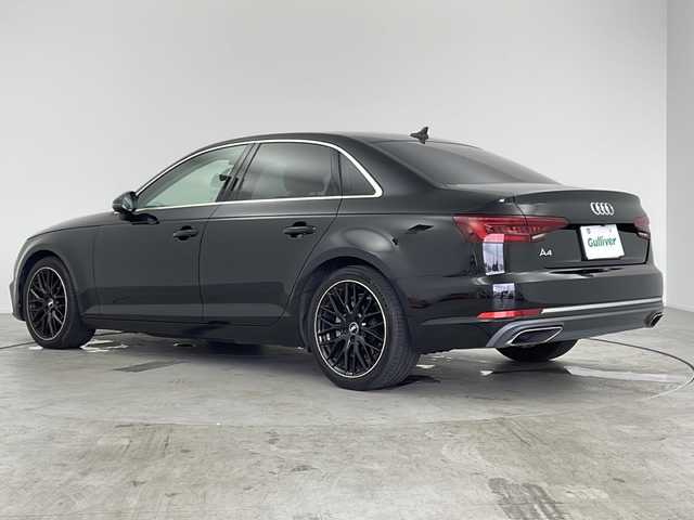 アウディ Ａ４ 35TFSIスポーツ ブラックエレガンス 愛知県 2019(令1)年 1.3万km ミトスブラックメタリック 125台限定車”black elegance”/禁煙車/純正MMIナビ/フルセグTV/サラウンドビューカメラ/バックカメラ/ビルトインETC2.0/純正ドライブレコーダー/マルチカラーアンビエントライト[特別装備]/純正フロアマット[特別装備]/純正18インチアルミホイール(10Yスポークデザイングロスブラックポリッシュド)[特別装備]/ラグジュアリーパッケージ/アシスタンスベーシックパッケージ/アシスタンスパッケージ/アウディプレセンスシティ/アウディプレセンスリヤ/アダプティブクルーズコントロール/アクティブレーンアシスト/アウディサイドアシスト/アウディパークアシスト/LEDヘッドライト/ハイビームアシスト/LEDリヤコンビライト/3ゾーンオートエアコン/パーシャルレザーシート/前席パワーシート/運転席ポジションメモリー/内装アルミニウムエリプス加飾/バーチャルコックピット/タイヤ空気圧警告/革巻きステアリング/ステアリングスイッチ/パドルシフト/プッシュスタート/電動格納ミラーウィンカー/電子パーキングブレーキ/ブレーキホールド/新車保証書・取扱説明書/記録簿R3~R6