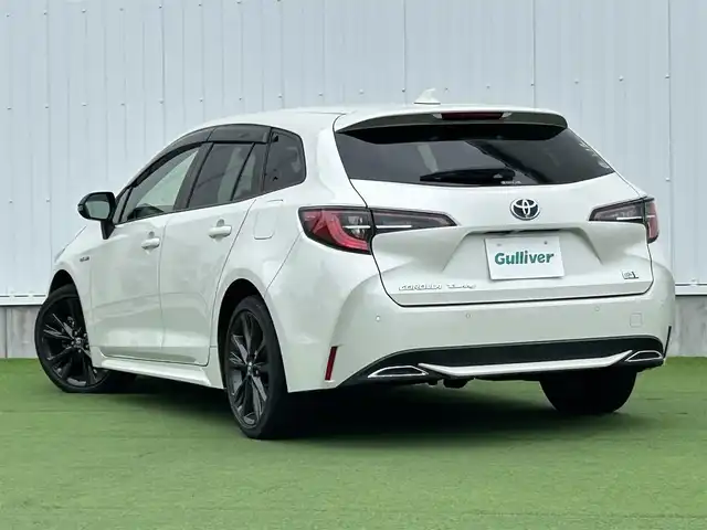 トヨタ カローラツーリング ハイブリッド ダブルバイビー 香川県 2020(令2)年 5.4万km ホワイトパールクリスタルシャイン 登録時走行距離：53410km/純正ナビ /フルセグ　/Bカメラ　/クルコン　/ETC　/ドラレコ /革巻きステアリング　/ステアリングリモコン　/純正AW　/純正フロアマット　/レーンキープアシスト　/BSM　/レベライザー/シートヒーター　/スペアキー/プッシュスタート