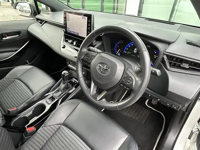 トヨタ カローラツーリング ハイブリッド ダブルバイビー 香川県 2020(令2)年 5.4万km ホワイトパールクリスタルシャイン 登録時走行距離：53410km/純正ナビ /フルセグ　/Bカメラ　/クルコン　/ETC　/ドラレコ /革巻きステアリング　/ステアリングリモコン　/純正AW　/純正フロアマット　/レーンキープアシスト　/BSM　/レベライザー/シートヒーター　/スペアキー/プッシュスタート
