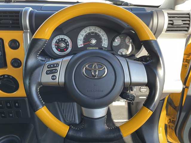 トヨタ ＦＪクルーザー オフロードパッケージ 岩手県 2012(平24)年 7.2万km イエロー/ホワイト ビルシュタイン製モノチューブショックアブソーバー　クロールコントロール　アクティブトラクションコントロール　リヤデフロック　純正ナビ　バックＣ　フルセグ　ＥＴＣ　クルコン　１７インチＡＷ　ルーフラック