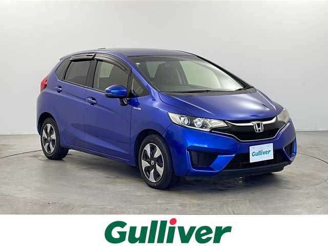 ホンダ フィット ハイブリット Fパッケージ 栃木県 2016(平28)年 3.4万km ブリリアントスポーティブルーメタリック2トーン 福祉車両/助手席回転シート/禁煙車/純正メモリーナビ/・ワンセグ/CD/Bluetooth/SD/USB/バックカメラ/ビルトインETC/前後ドライブレコーダー/オートライト/ステアリングスイッチ/電動格納ウインカーミラー/純正フロアマット/ドアバイザー/●純正ホイールカバー/●保証書/●取扱説明書