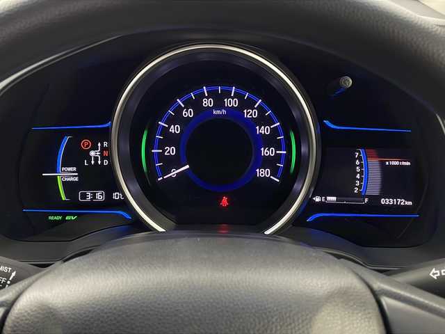 ホンダ フィット ハイブリット Fパッケージ 栃木県 2016(平28)年 3.4万km ブリリアントスポーティブルーメタリック2トーン 福祉車両/助手席回転シート/禁煙車/純正メモリーナビ/・ワンセグ/CD/Bluetooth/SD/USB/バックカメラ/ビルトインETC/前後ドライブレコーダー/オートライト/ステアリングスイッチ/電動格納ウインカーミラー/純正フロアマット/ドアバイザー/●純正ホイールカバー/●保証書/●取扱説明書