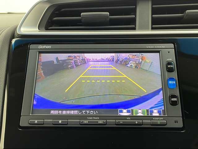 ホンダ フィット ハイブリット Fパッケージ 栃木県 2016(平28)年 3.4万km ブリリアントスポーティブルーメタリック2トーン 福祉車両/助手席回転シート/禁煙車/純正メモリーナビ/・ワンセグ/CD/Bluetooth/SD/USB/バックカメラ/ビルトインETC/前後ドライブレコーダー/オートライト/ステアリングスイッチ/電動格納ウインカーミラー/純正フロアマット/ドアバイザー/●純正ホイールカバー/●保証書/●取扱説明書