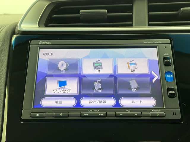 ホンダ フィット ハイブリット Fパッケージ 栃木県 2016(平28)年 3.4万km ブリリアントスポーティブルーメタリック2トーン 福祉車両/助手席回転シート/禁煙車/純正メモリーナビ/・ワンセグ/CD/Bluetooth/SD/USB/バックカメラ/ビルトインETC/前後ドライブレコーダー/オートライト/ステアリングスイッチ/電動格納ウインカーミラー/純正フロアマット/ドアバイザー/●純正ホイールカバー/●保証書/●取扱説明書