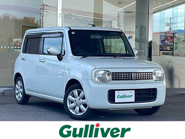 スズキ ラパン X セレクション 福島県 2013(平25)年 8万km パールホワイト 登録時走行距離：79934km/メモリナビ/ (DVD/CD/BT/SD/AM/FM)/バックカメラ/プッシュスタート/ミラー型ドラレコ/ETC/アイドリングストップ/シートヒーター/ (D席/N席)/ドアバイザー/電動格納ミラー/純正フロアマット/純正14インチAW/スマートキー/スペアキー/保証書/取扱説明書