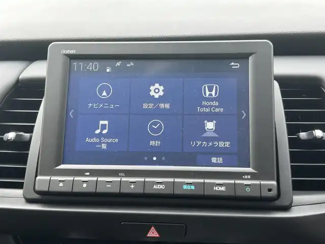 ホンダ フィット e:HEVホーム 長崎県 2023(令5)年 0.1万km プラチナホワイトパール ワンオーナー/純正HDDナビ/(CD/DVD/BT/フルセグ)/バックカメラ/衝突軽減ブレーキ/レーンアシスト/コーナーセンサー/レーダークルーズ/ハーフレザーシート/ETC/オートライト/電子パーキングブレーキ/電動格納ミラー