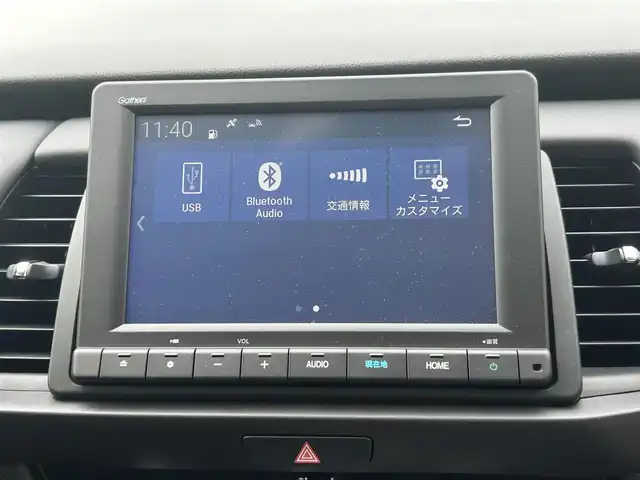 ホンダ フィット e:HEVホーム 長崎県 2023(令5)年 0.1万km プラチナホワイトパール ワンオーナー/純正HDDナビ/(CD/DVD/BT/フルセグ)/バックカメラ/衝突軽減ブレーキ/レーンアシスト/コーナーセンサー/レーダークルーズ/ハーフレザーシート/ETC/オートライト/電子パーキングブレーキ/電動格納ミラー