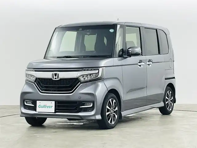 ホンダ Ｎ ＢＯＸ カスタム G L ホンダセンシング 福島県 2020(令2)年 2.4万km シャイニンググレーM ホンダセンシング/・衝突軽減ブレーキ/・レーンキープアシスト/・レーダークルーズコントロール/・先行車発進お知らせ機能/純正ナビ/・型番：VXM-204VFi/・フルセグTV/CD/DVD/BT/USB/・バックカメラ/・ETC/・ドライブレコーダー/左側パワースライドドア/ステアリングリモコン/シートヒーター(運転席/助手席)/プッシュスタート/・スマートキー/・スペアキー/LEDヘッドライト/・オートライト/・フォグライト/純正フロアマット/電動格納ウィンカーミラー/社外AW付スタッドレスタイヤ積込/・155/65R14 4mm