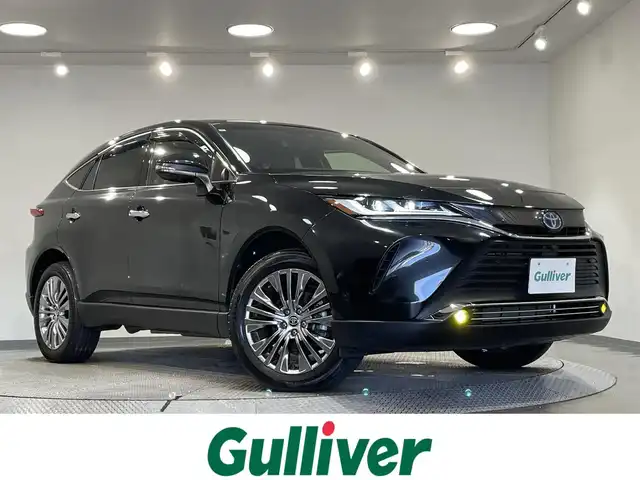 トヨタ ハリアー ハイブリッド Z レザーパッケージ 愛知県 2021(令3)年 1.7万km プレシャスブラックパール 純正12.3インチディスプレイオーディオ/パノラマルーフ/JBLプレミアムサウンド/レザーシート/トヨタセーフティセンス/衝突軽減ブレーキ/パノラミックビューモニター/ヘッドアップディスプレイ/レーダークルーズコントロール/ビルトインETC2.0/シートヒーター/エアシート/LEDヘッドライト/フォグランプ/デジタルインナーミラー/ブラインドスポットモニター/ステアリングヒーター/パワーシート/電動リアゲート/フルセグTV/Bluetooth/コーナーセンサー/レーンキープアシスト/オートハイビーム/Carplay/プッシュスタート/USB接続/スマートキー/ミュージックプレイヤー接続/純正フロアマット/純正アルミホイール/オートライト/ステアリングリモコン/電動パーキングブレーキ/オートブレーキホールド
