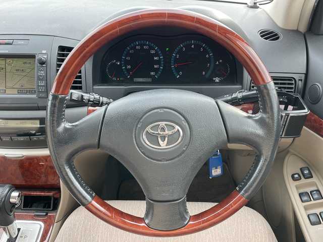 トヨタ プレミオ X Lパッケージ LTD 道央・札幌 2003(平15)年 7.4万km シルバーM ４WD/純正メモリーナビ/AM/FM/CD/ワンセグ/バックカメラ/革巻きウッドコンビステアリング/リモコンキー/キセノンヘッドライト/オートライト/フォグランプ/ヘッドライトレベライザー/電動格納ミラー/純正フロアマット/ドアバイザー/社外エンジンスターター