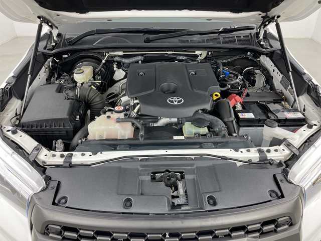 トヨタ ハイラックス Z ブラックラリーエディション 道央・札幌 2020(令2)年 1.9万km スーパーホワイトⅡ ・4WD/・寒冷地仕様/・社外ナビ（CN-RE05WD）/・BT&CD&DVD&フルセグTV/・バック、左サイド、フロントカメラ/・トヨタセーフティセンス/・レーンディパーチャーアラート/・アダプティブクルーズコントロール/・フロントワイパーデアイサー/・ドアミラーヒーター/・ダウンヒルアシストコントロール/・オートライト/・LEDヘッドライト/・社外LEDスモークテール/・TRDステッキガード/・TRDロールバー/・トノカバー/・社外電動格納サイドステップ/・リアステップ/・積込純正サイドステップ/・レザー調シートカバー