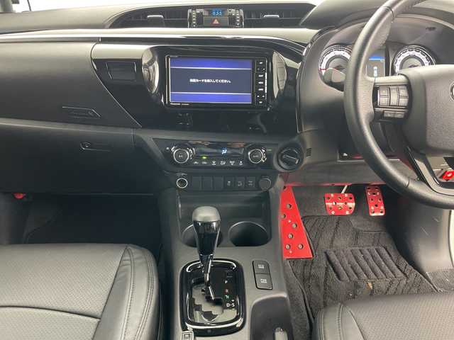 トヨタ ハイラックス Z ブラックラリーエディション 道央・札幌 2020(令2)年 1.9万km スーパーホワイトⅡ ・4WD/・寒冷地仕様/・社外ナビ（CN-RE05WD）/・BT&CD&DVD&フルセグTV/・バック、左サイド、フロントカメラ/・トヨタセーフティセンス/・レーンディパーチャーアラート/・アダプティブクルーズコントロール/・フロントワイパーデアイサー/・ドアミラーヒーター/・ダウンヒルアシストコントロール/・オートライト/・LEDヘッドライト/・社外LEDスモークテール/・TRDステッキガード/・TRDロールバー/・トノカバー/・社外電動格納サイドステップ/・リアステップ/・積込純正サイドステップ/・レザー調シートカバー